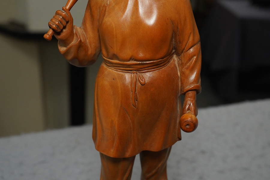 A Chinese boxwood figure of a female juggler, attributed to Zhu Zichang (1876-1934), Republic period